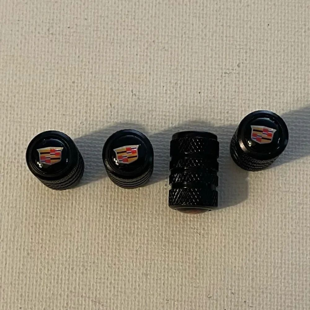Cadillac Logo Valve Stem Caps in Black set of 4 NWT